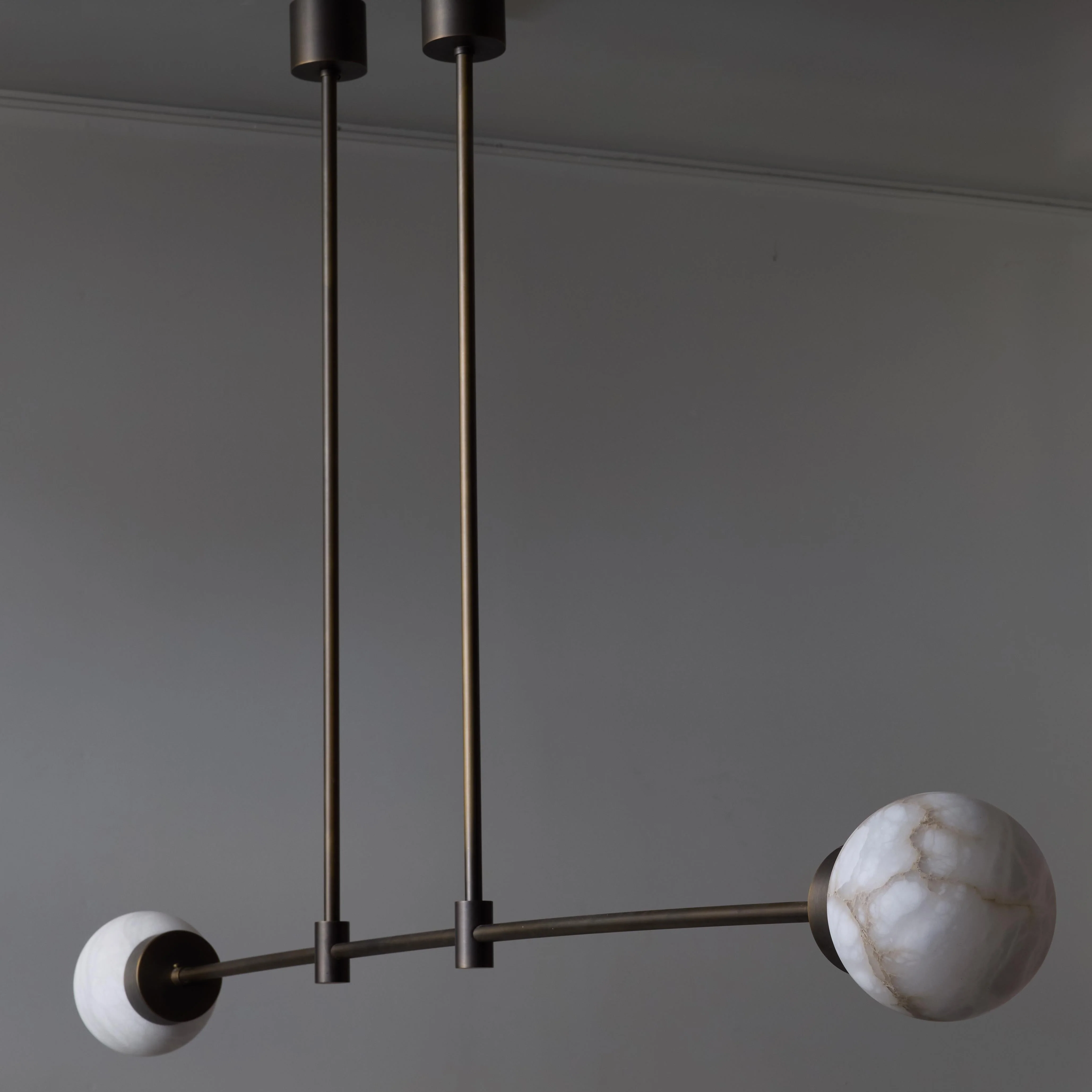 Brass and Alabaster Globes Asymmetrical Line Chandelier - Image 2