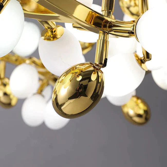 Post Modern Linear Grape Branch Chandelier Over Dining Table - Image 6